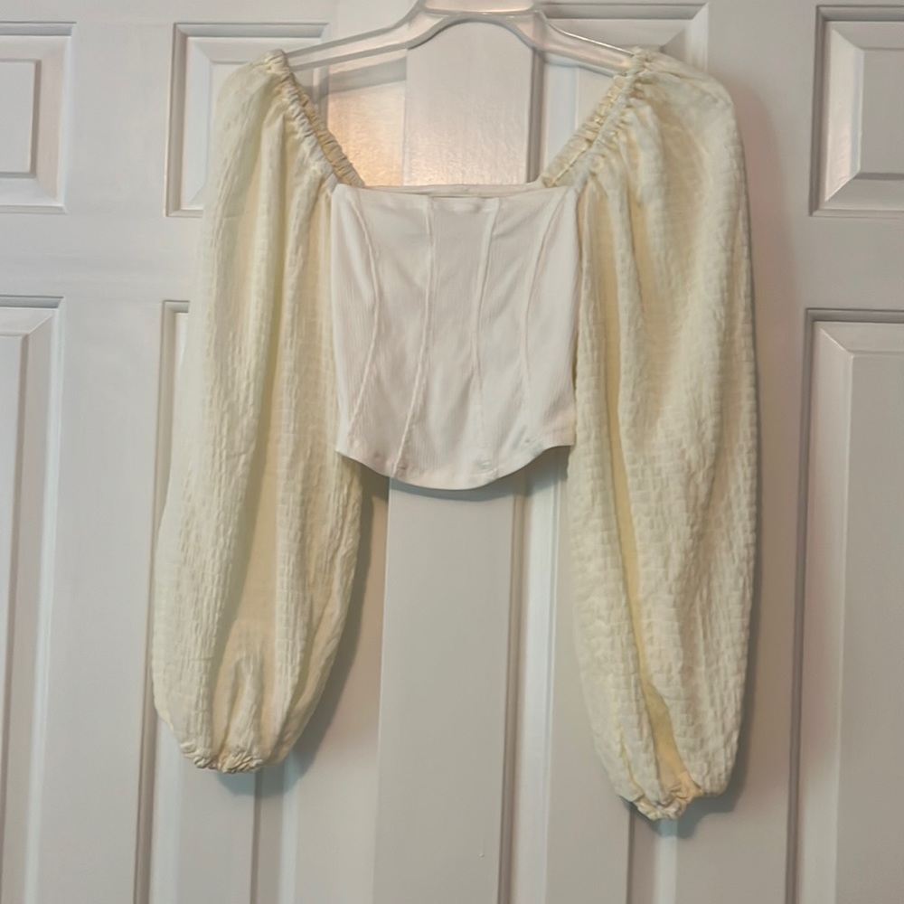 Top with puffy sleeves